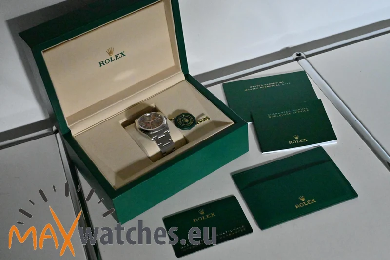 Rolex Oyster Perpetual 36 126000 Multicoloured Jubilee Motif Dial