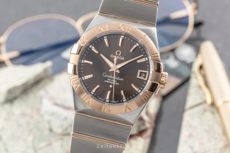 Omega Constellation steel / gold automatic men's watch 123.20.38.21.13.001 VP: 12600EUR [2604880]