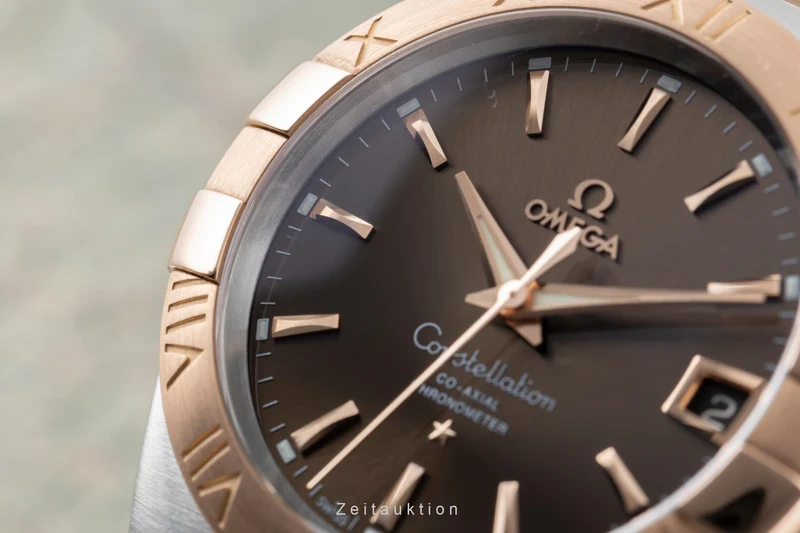 Omega Constellation steel / gold automatic men's watch 123.20.38.21.13.001 VP: 12600EUR [2604880]