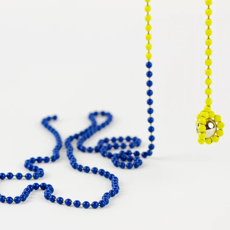 UNO - Interactiver MAGNETSCHMUCK (Zweifarbig) von Luis Pons