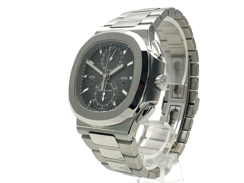 Patek Philippe Nautilus 5990/1A-001 Travel Time aus 2018 D-Papiere