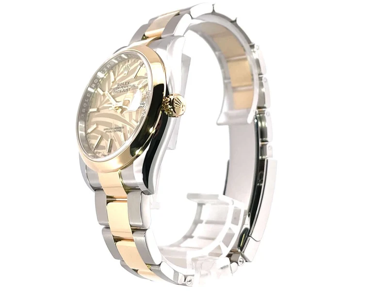Rolex Datejust 36 Oystersteel - Gelbgold 126203 Golden Palmenmuster