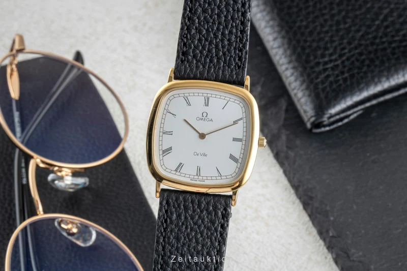 Omega De Ville gilt-brass quartz men's watch 195.0077 Vintage [2600140]