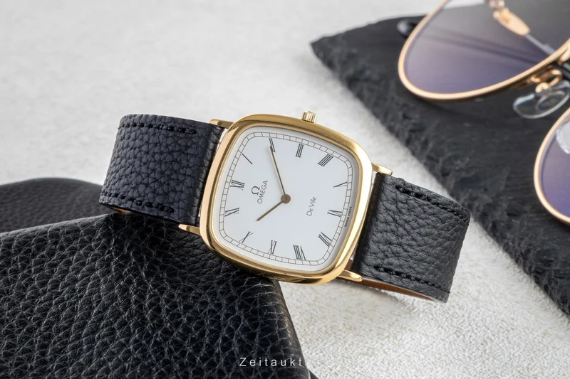 Omega De Ville gilt-brass quartz men's watch 195.0077 Vintage [2600140]