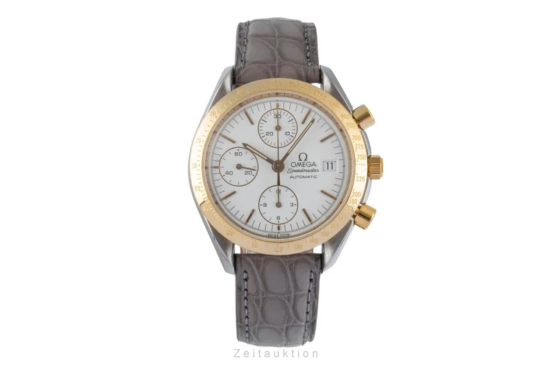 Omega Speedmaster Date chronograph steel / gold automatic men's watch 3311.20 LP: 8200EUR [2600526]