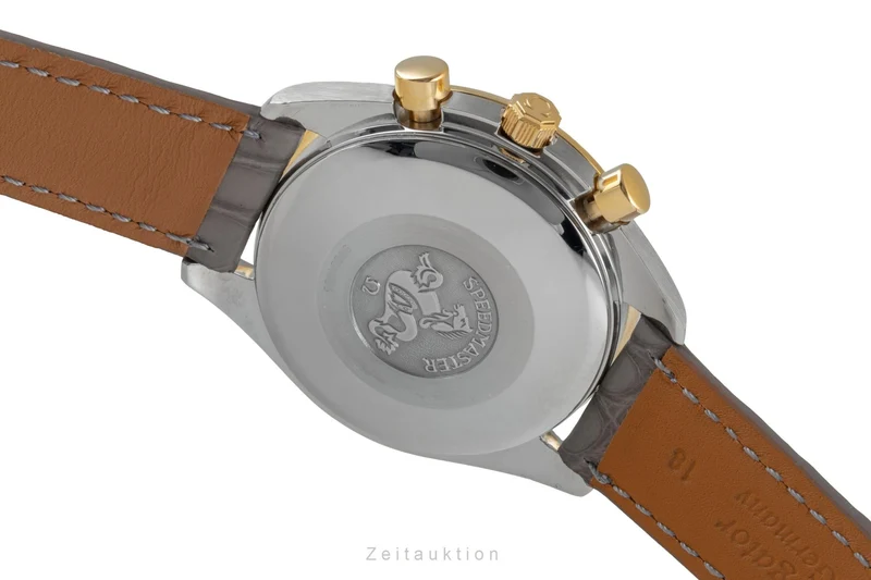Omega Speedmaster Date chronograph steel / gold automatic men's watch 3311.20 LP: 8200EUR [2600526]