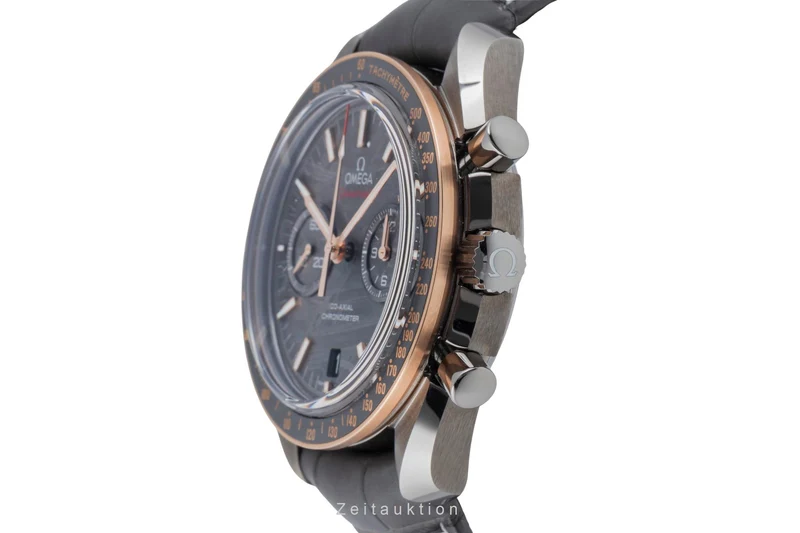 Omega Speedmaster Moonwatch chronograph ceramic / gold automatic men's watch 311.63.44.51.99.001 LP: 15900EUR [2506570]