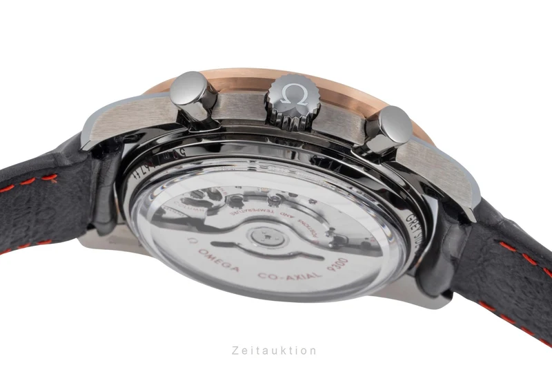 Omega Speedmaster Moonwatch chronograph ceramic / gold automatic men's watch 311.63.44.51.99.001 LP: 15900EUR [2506570]