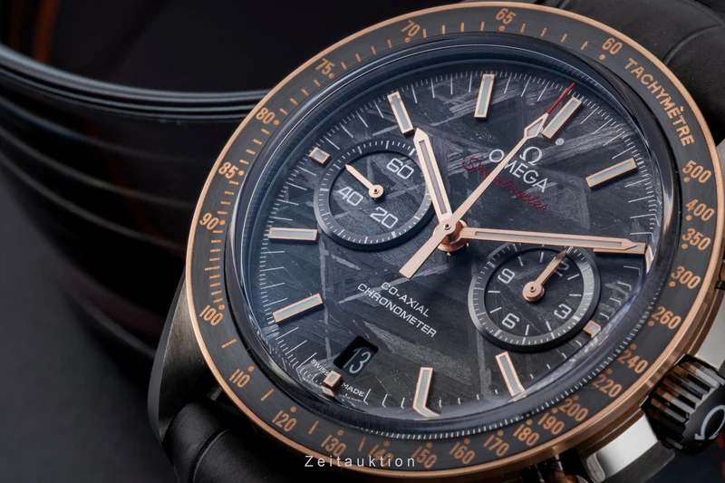 Omega Speedmaster Moonwatch chronograph ceramic / gold automatic men's watch 311.63.44.51.99.001 LP: 15900EUR [2506570]