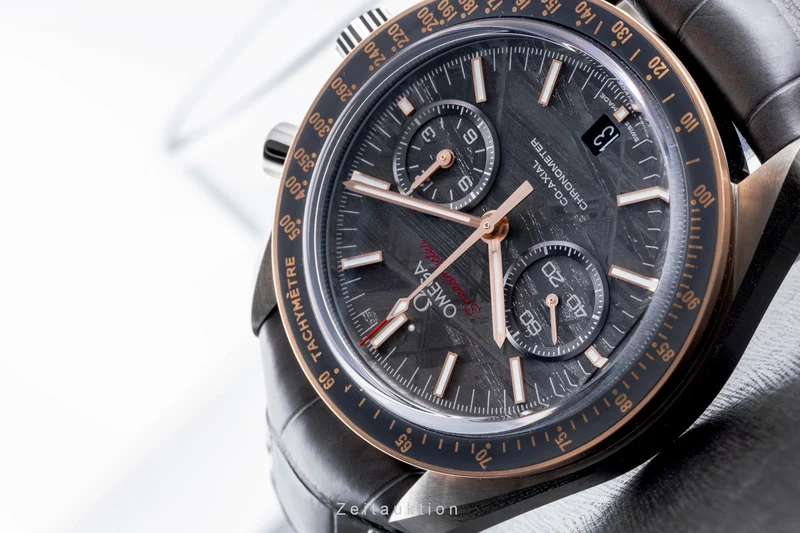 Omega Speedmaster Moonwatch chronograph ceramic / gold automatic men's watch 311.63.44.51.99.001 LP: 15900EUR [2506570]