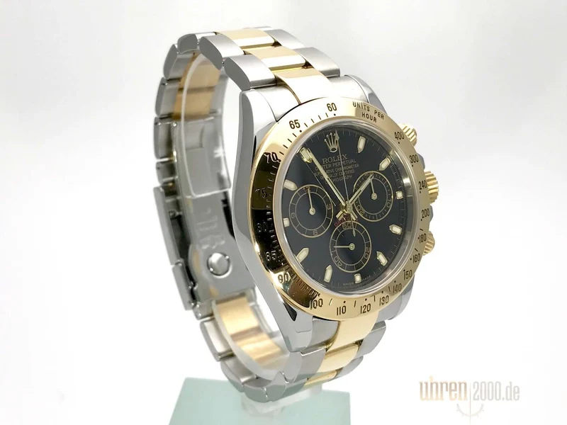Rolex Daytona 40 Edelstahl Gelbgold 116523 Schwarz gebraucht aus 2005