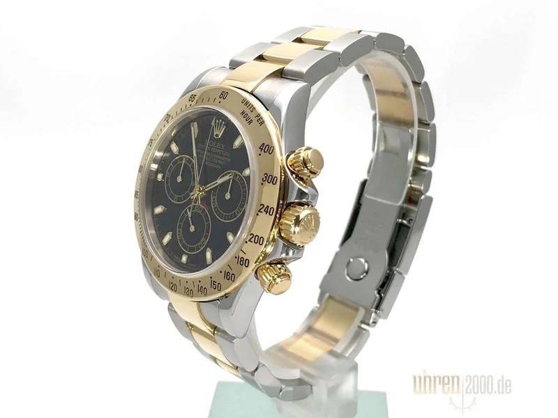 Rolex Daytona 40 Edelstahl Gelbgold 116523 Schwarz gebraucht aus 2005